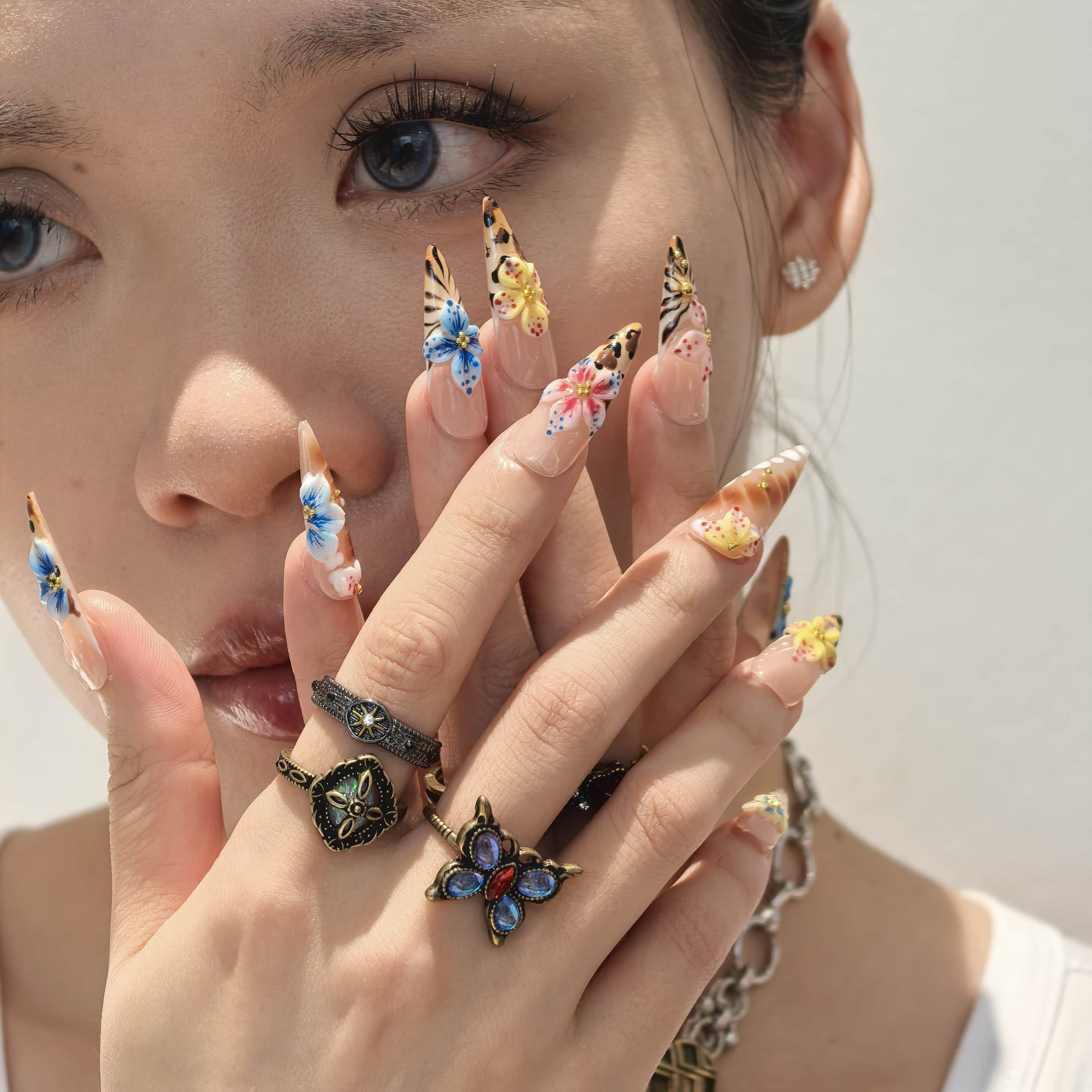 Amber Garden reusable PMMA stiletto press-on nails – fearless leopard floral nail art for festivals and editorial fashion looks