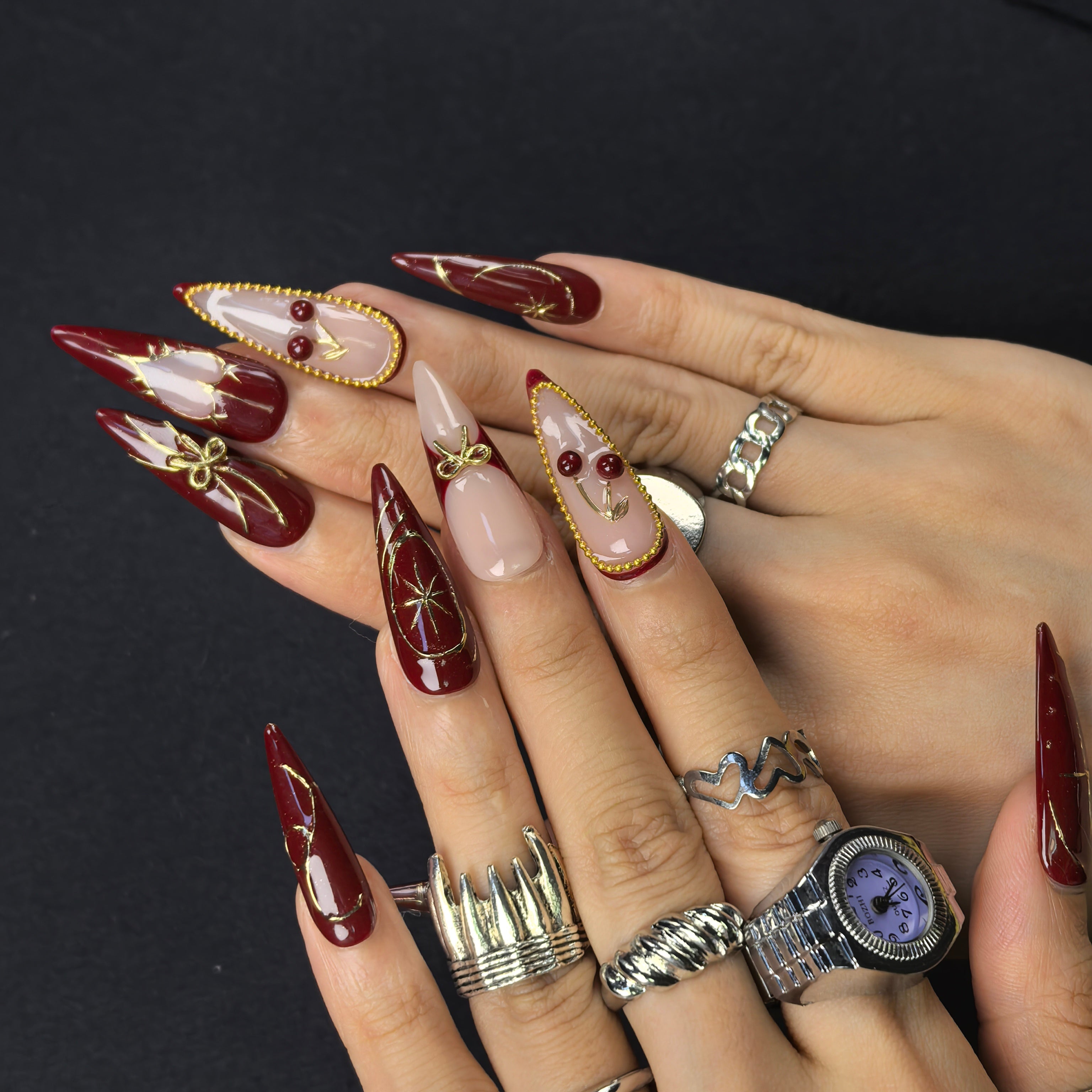 Cherry Bite retro glamour press-on nails – burgundy base with soft nude French tips and 3D cherry charm details