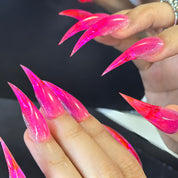 Close-up of Cat Claw #6 press-on nails — hot pink holographic glitter rose quartz shimmer cat claw nail art