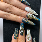 Gilded Cosmos 30mm stiletto press-on nails — hand-painted gold galaxy luxury fake nails for women