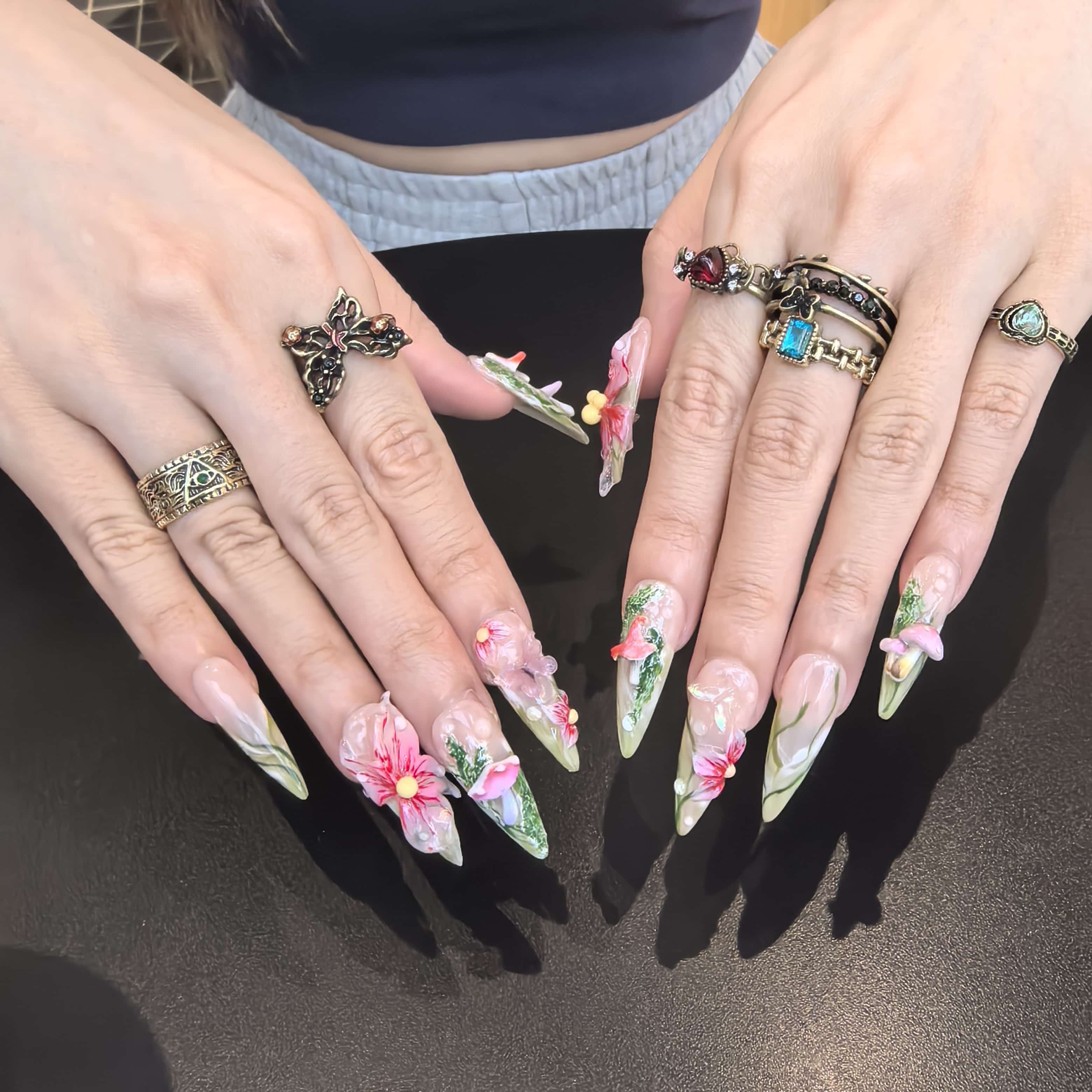 Hallucinogenic stiletto press-on nails – enchanting floral and mushroom details on nude base, 26–30mm fairycore style