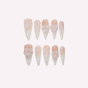 Mermaid Vein press-on nails – sculpted 3D white flower blooms and embossed vine patterns on translucent pink gradient base