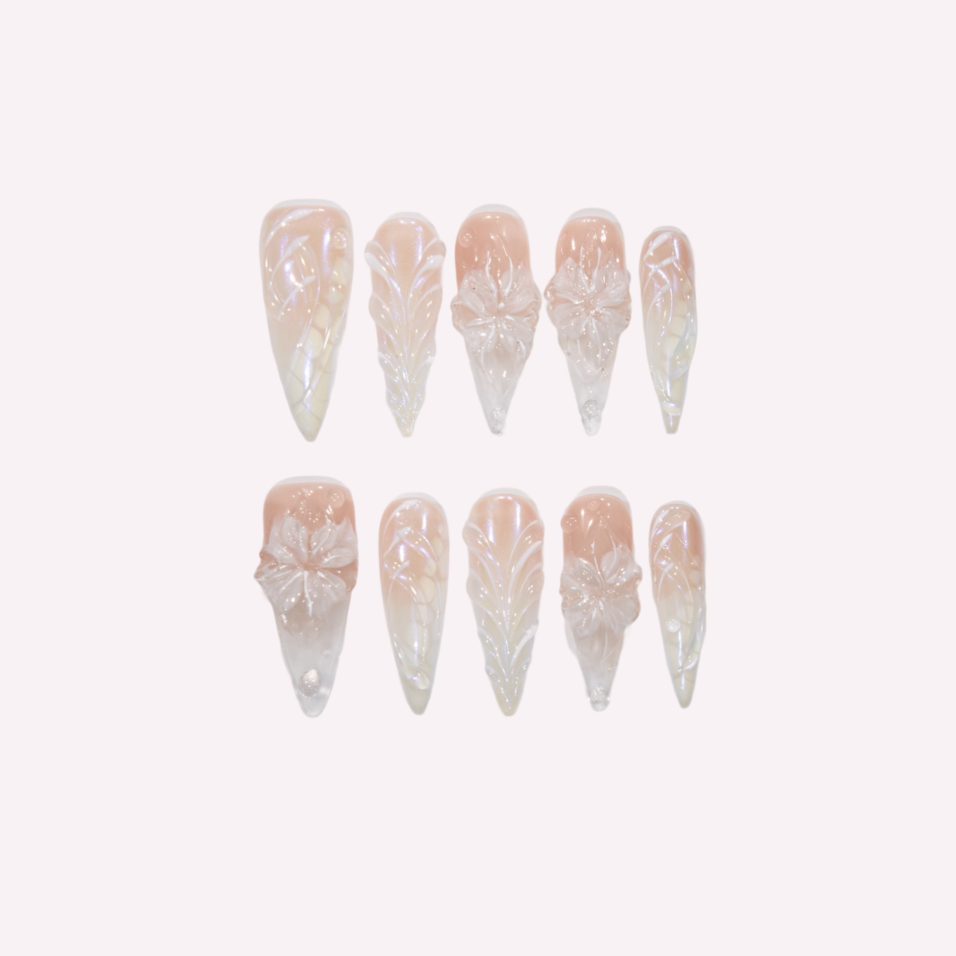 Mermaid Vein press-on nails – sculpted 3D white flower blooms and embossed vine patterns on translucent pink gradient base