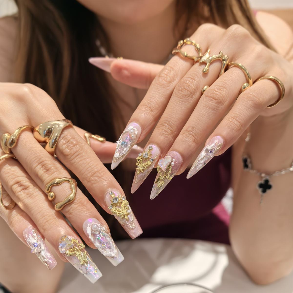 Pink Fairytale 30mm stiletto press-on nails — hand-painted blush pink floral luxury fake nails for women