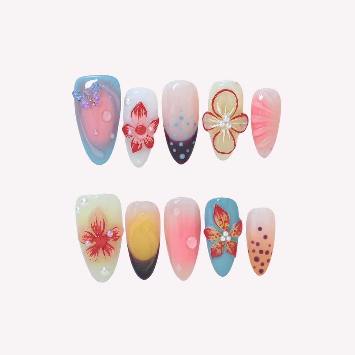 PoorGuyShop Blush Bloom handmade almond press-on nails – soft pastel bases with vibrant flower motifs and butterfly accents