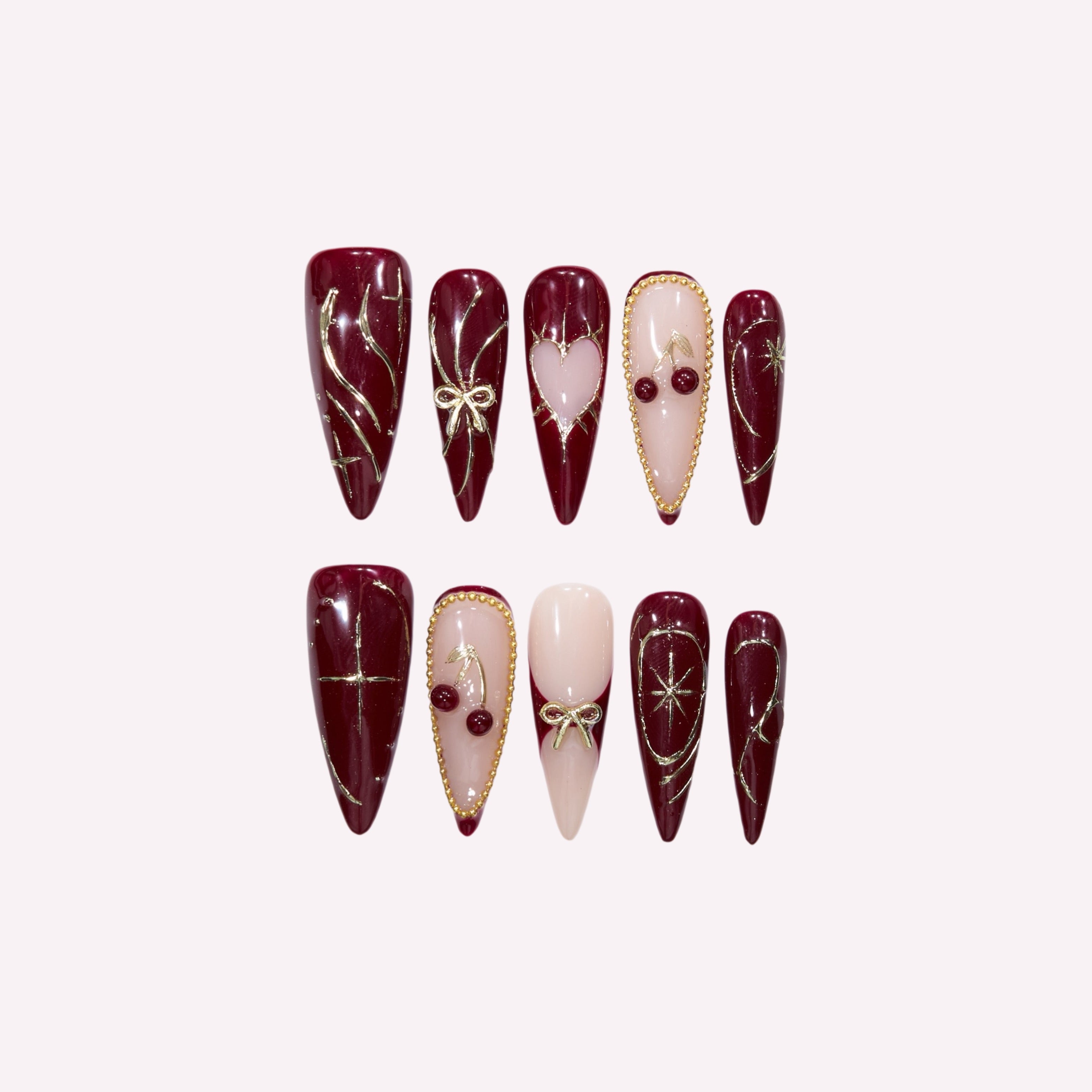 PoorGuyShop Cherry Bite handmade stiletto press-on nails – deep burgundy base with 3D cherry charms and gold ribbon swirl accents