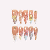 PoorGuyShop Floral handmade pastel stiletto press-on nails – peachy-pink base with dainty flower motifs and lace patterns