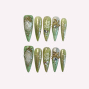 PoorGuyShop Wizard of Oz handmade stiletto press-on nails – gradient green base with lace patterns and gold-plated bow accents