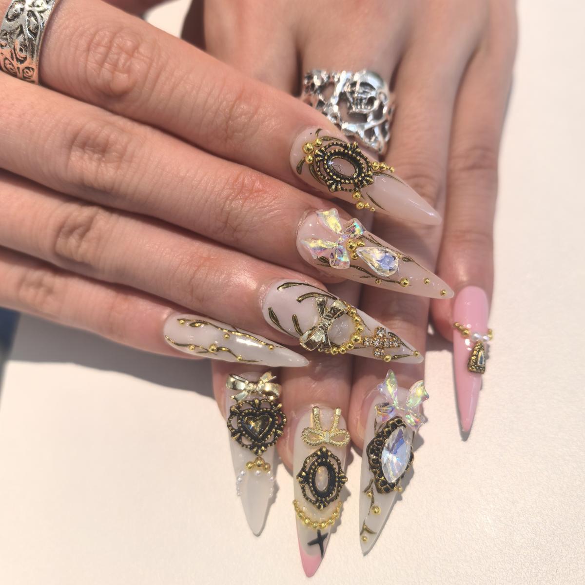 Skater Girl 30mm stiletto press-on nails — hand-painted gold gem bow crystal luxury fake nails for women