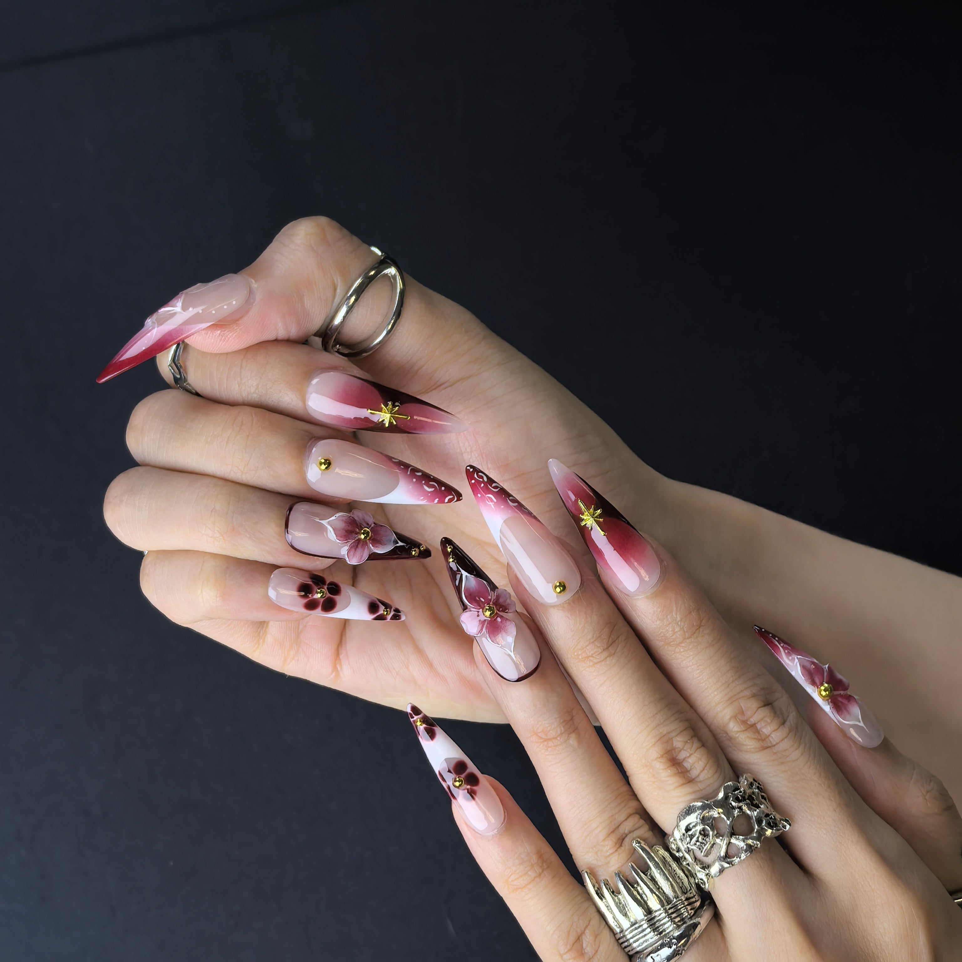 Starlit Bloom 28mm almond press-on nails — artisan hand-painted fake nails with glittering celestial floral nail art