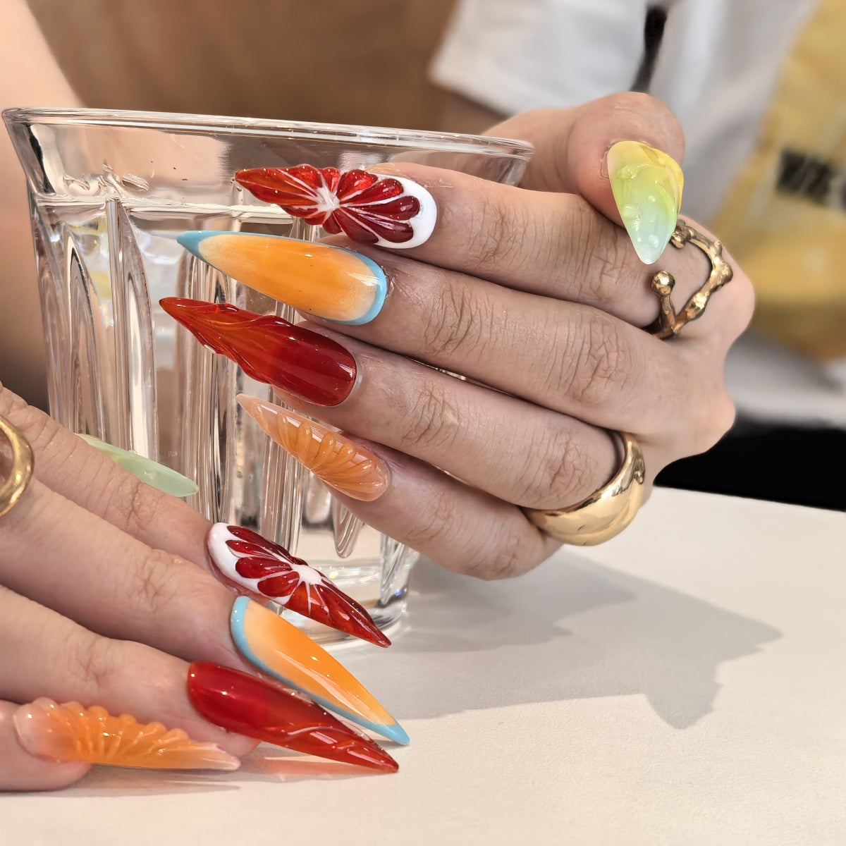 Tropical Pop press-on nails close-up – neon green water-drop texture and realistic fruit slice patterns, 25–30mm
