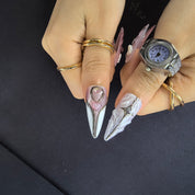 Woman wearing Sailor Moon handmade press-on nails — pink lavender 3D bow heart nail art stiletto by Poorguyshop