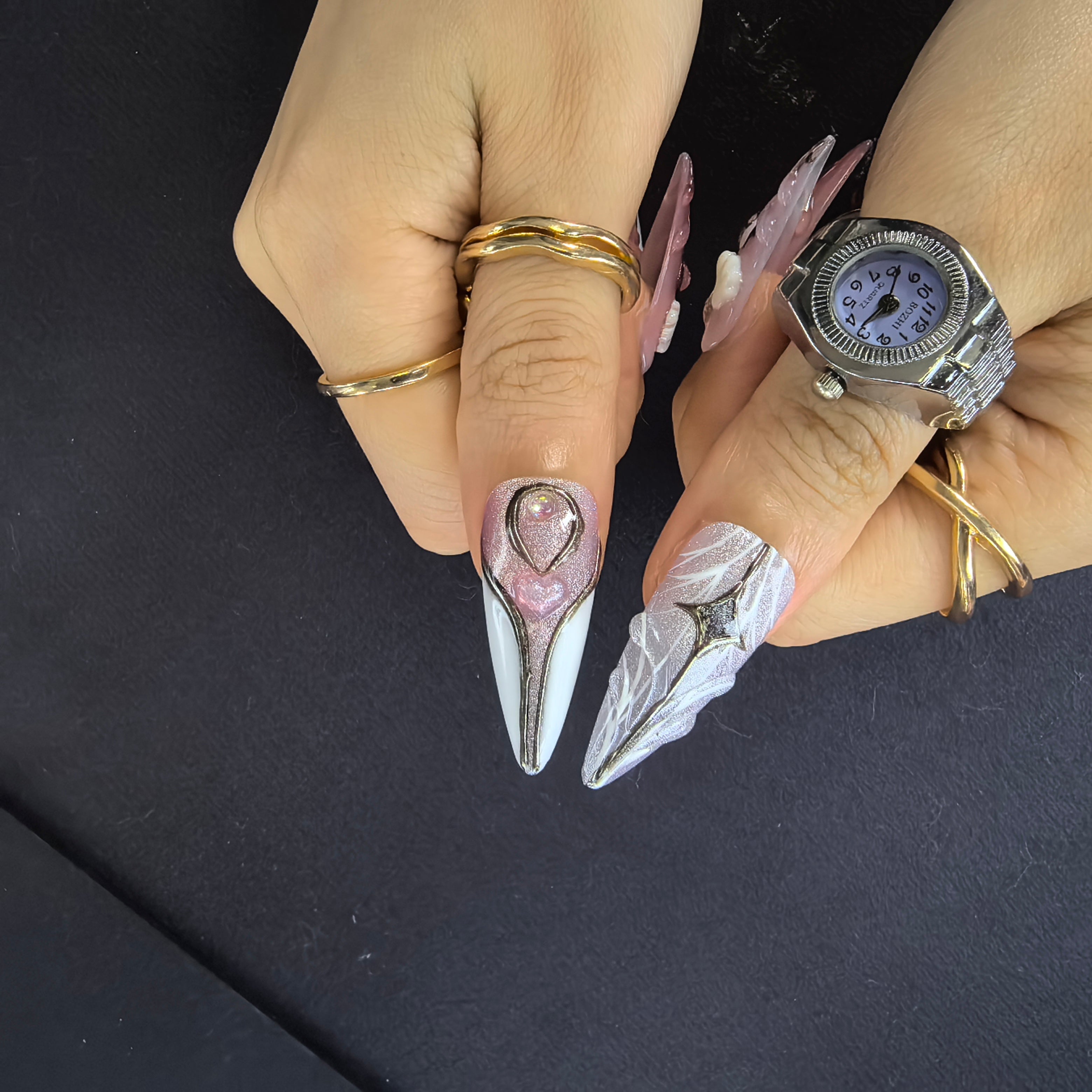 Woman wearing Sailor Moon handmade press-on nails — pink lavender 3D bow heart nail art stiletto by Poorguyshop